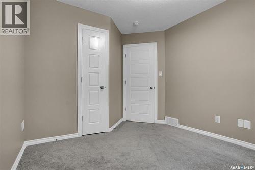 124 3229 Elgaard Drive, Regina, SK - Indoor Photo Showing Other Room