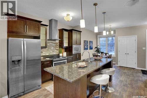124 3229 Elgaard Drive, Regina, SK - Indoor Photo Showing Kitchen With Stainless Steel Kitchen With Upgraded Kitchen