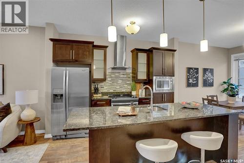 124 3229 Elgaard Drive, Regina, SK - Indoor Photo Showing Kitchen With Upgraded Kitchen