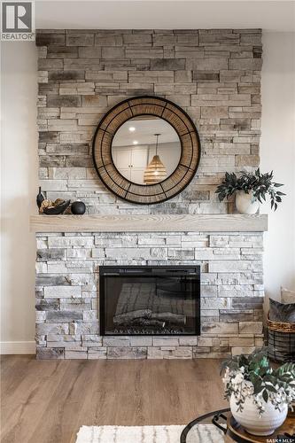 415 Sharma Crescent, Saskatoon, SK - Indoor Photo Showing Living Room With Fireplace
