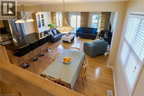 Dining space with light wood finished floors - 126 Snowdrop Crescent, Kitchener, ON - Indoor Photo Showing Living Room