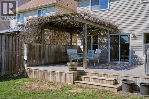 Wooden terrace with outdoor dining area - 126 Snowdrop Crescent, Kitchener, ON - Outdoor With Deck Patio Veranda