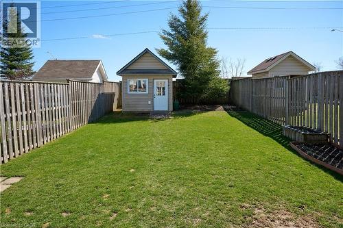 Fenced backyard with an outbuilding - 126 Snowdrop Crescent, Kitchener, ON - Outdoor