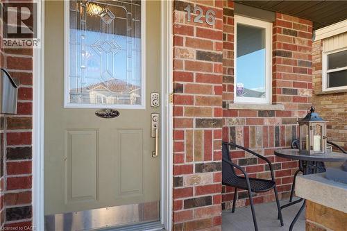 View of exterior entry with brick siding - 126 Snowdrop Crescent, Kitchener, ON - Outdoor With Exterior