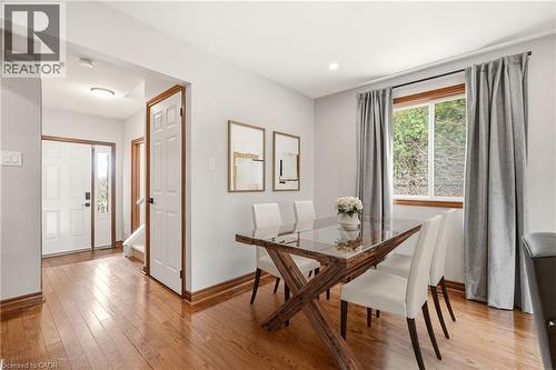 The property features hardwood flooring throughout the main level - 1 Tomahawk Drive, Grimsby, ON - Indoor Photo Showing Dining Room