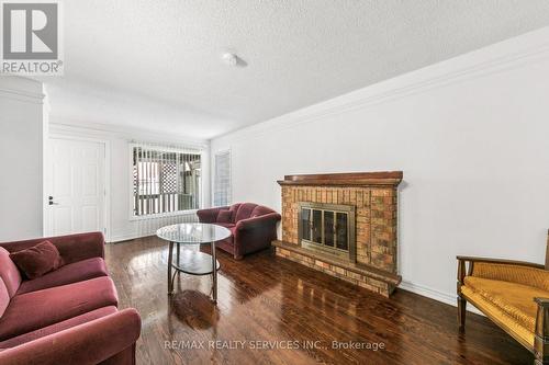 4 Burt Drive, Brampton, ON - Indoor Photo Showing Living Room With Fireplace