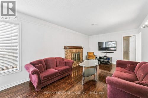 4 Burt Drive, Brampton, ON - Indoor Photo Showing Living Room With Fireplace
