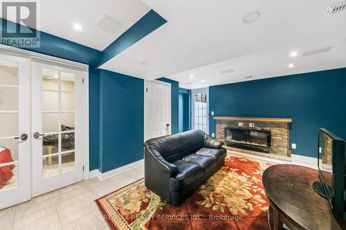 4 Burt Drive, Brampton, ON - Indoor Photo Showing Living Room With Fireplace