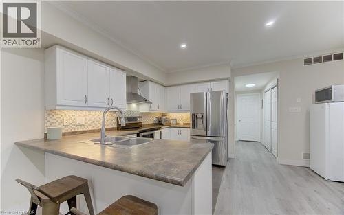 50 Howe Drive W Unit# 4D, Kitchener, ON - Indoor Photo Showing Kitchen With Double Sink