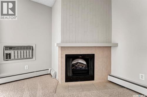202B 1121 Mckercher Drive, Saskatoon, SK - Indoor With Fireplace