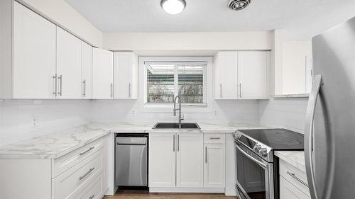 740 Raymer Avenue  Kelowna, BC V1Y 4Z8