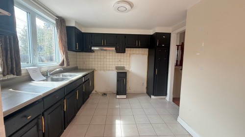 Cuisine - 7 Rue Tremayne, Dollard-Des-Ormeaux, QC - Indoor Photo Showing Kitchen With Double Sink
