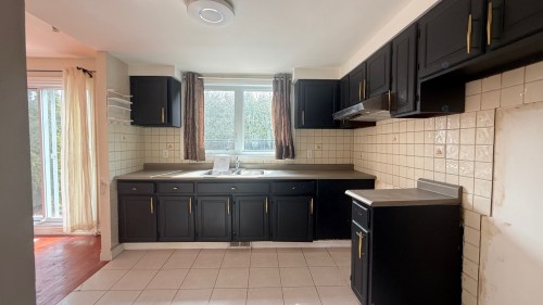 Cuisine - 7 Rue Tremayne, Dollard-Des-Ormeaux, QC - Indoor Photo Showing Kitchen With Double Sink