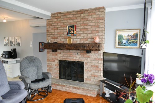 Salon - 478 Rue Sylvio, Drummondville, QC - Indoor Photo Showing Living Room With Fireplace