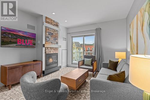 422 - 190 Jozo Weider Boulevard, Blue Mountains, ON - Indoor Photo Showing Living Room With Fireplace
