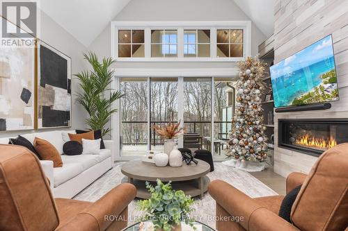 Oh what a view! - 18 - 190 Canboro Road, Pelham (Fonthill), ON - Indoor Photo Showing Living Room With Fireplace