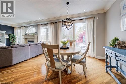 11 Tremaine Drive, Kitchener, ON - Indoor Photo Showing Dining Room With Fireplace