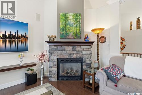 1202 Beechmont View, Saskatoon, SK - Indoor Photo Showing Living Room With Fireplace
