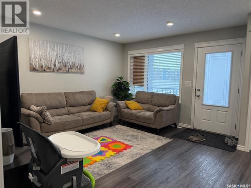 201 110 Akhtar Bend, Saskatoon, SK - Indoor Photo Showing Living Room