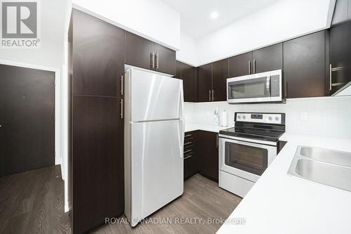 308 - 55 Speers Road, Oakville, ON - Indoor Photo Showing Kitchen With Double Sink