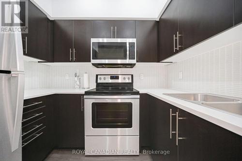 308 - 55 Speers Road, Oakville, ON - Indoor Photo Showing Kitchen With Double Sink