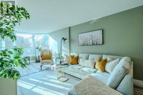203 - 8 Lisa Street, Brampton, ON - Indoor Photo Showing Living Room