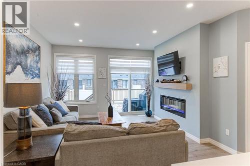 114 Livingston Drive, Tillsonburg, ON - Indoor Photo Showing Living Room With Fireplace