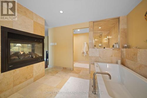 1104 The Parkway, London East (East B), ON - Indoor Photo Showing Bathroom With Fireplace