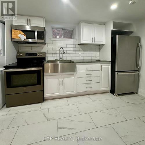 6 Lapp Street, Toronto (Rockcliffe-Smythe), ON - Indoor Photo Showing Kitchen With Double Sink