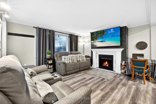 1914 Liverpool Road, Pickering, ON - Indoor Photo Showing Living Room With Fireplace