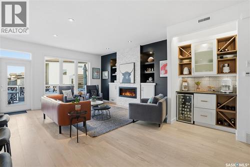 5322 Tutor Way, Regina, SK - Indoor Photo Showing Living Room With Fireplace