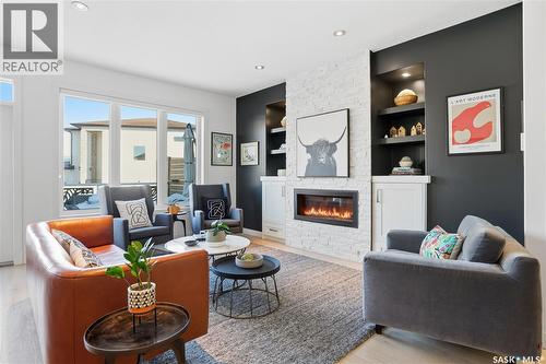 5322 Tutor Way, Regina, SK - Indoor Photo Showing Living Room With Fireplace