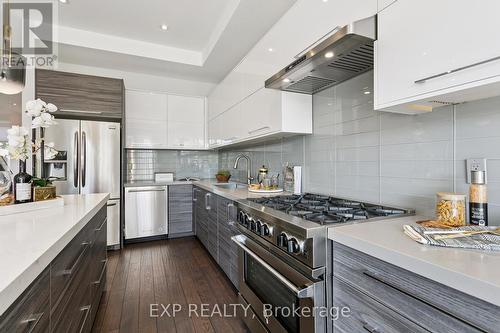 105 Twenty Second Street, Toronto, ON - Indoor Photo Showing Kitchen With Stainless Steel Kitchen With Upgraded Kitchen