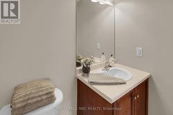 MAIN FLOOR TWO PIECE BATHROOM - 