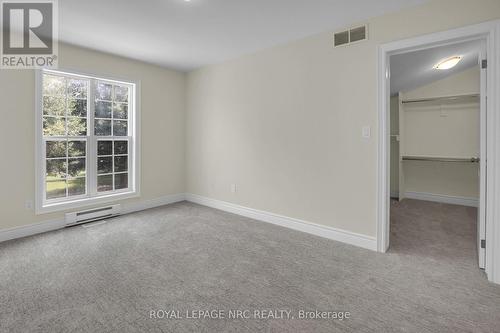 WITH WALK-IN CLOSET - 56 Queens Circle, Fort Erie (Crystal Beach), ON - Indoor Photo Showing Other Room