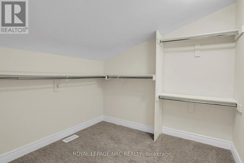 GENEROUS WALK IN CLOSET IS 8'6\" X 7'4\" - 56 Queens Circle, Fort Erie (Crystal Beach), ON - Indoor With Storage