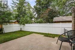 VIEW OF YARD FROM BACK PORCH - 
