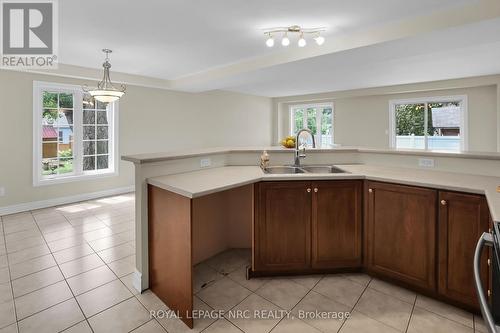 VIEW FROM THE KITCHEN - 56 Queens Circle, Fort Erie (Crystal Beach), ON - Indoor Photo Showing Kitchen With Double Sink