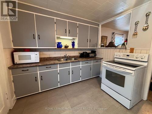 1022 Bridge Street, Frontenac (Frontenac Centre), ON - Indoor Photo Showing Kitchen With Double Sink