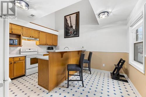 E12 - 1665 Nash Road, Clarington (Courtice), ON - Indoor Photo Showing Kitchen