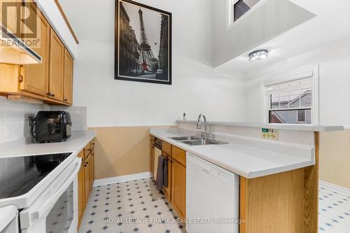 E12 - 1665 Nash Road, Clarington (Courtice), ON - Indoor Photo Showing Kitchen With Double Sink