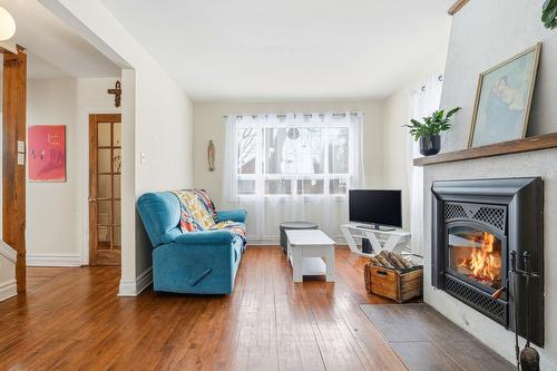 Salon - 1055 Rue St-Jacques, Longueuil (Le Vieux-Longueuil), QC - Indoor Photo Showing Living Room With Fireplace