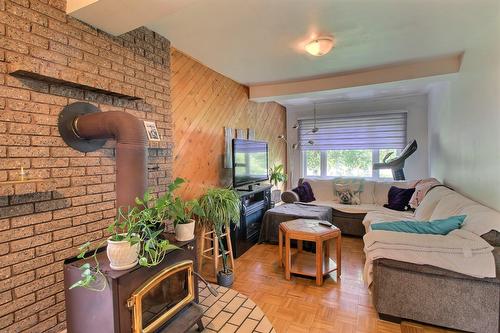 Salon - 344 Av. De L'Église, Rouyn-Noranda, QC - Indoor Photo Showing Living Room With Fireplace
