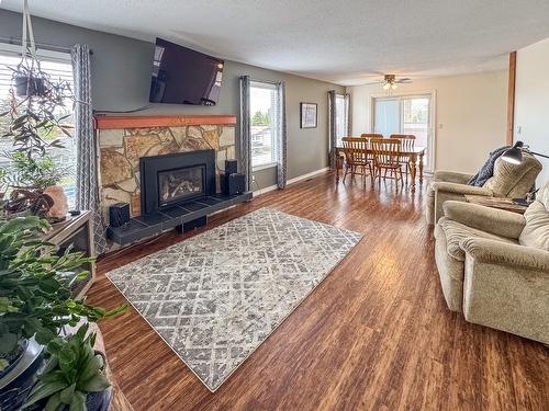 2001 7Th Street, Cranbrook, BC - Indoor Photo Showing Living Room With Fireplace