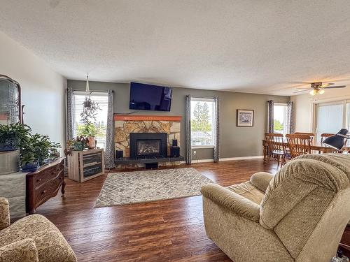 2001 7Th Street, Cranbrook, BC - Indoor Photo Showing Living Room With Fireplace