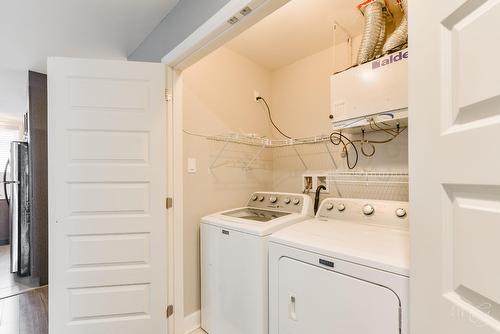 Salle de lavage - 149 Rue Desormeaux, Saint-Jérôme, QC - Indoor Photo Showing Laundry Room