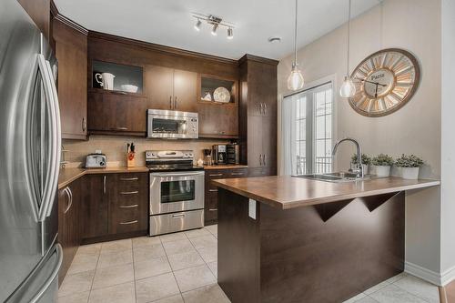 Cuisine - 203-645 Rue Montmartre, Mascouche, QC - Indoor Photo Showing Kitchen With Upgraded Kitchen