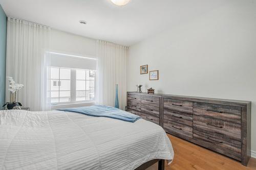 Chambre à coucher principale - 203-645 Rue Montmartre, Mascouche, QC - Indoor Photo Showing Bedroom