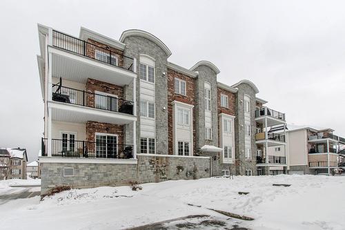 Face arrière - 203-645 Rue Montmartre, Mascouche, QC - Outdoor With Facade