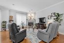 Salon - 203-645 Rue Montmartre, Mascouche, QC  - Indoor Photo Showing Living Room With Fireplace 